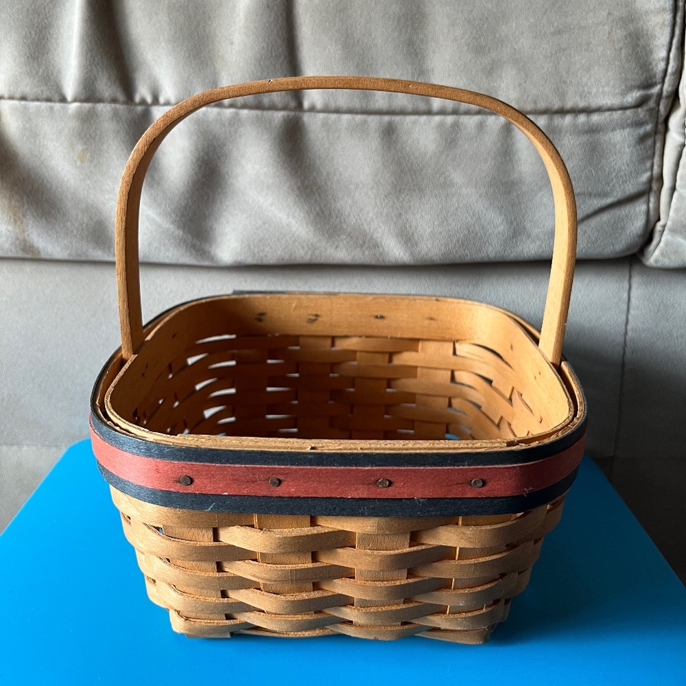 Longaberger 5 1/2 inch basket with handle
